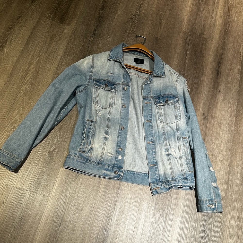 Distressed light wash Jean jacket